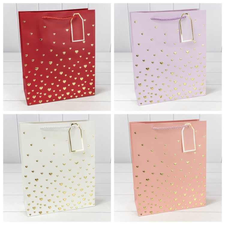 Пакет подарочный с тиснением "Сердечки" (микс 1) 26*32*12 210г 1/20 1/240 Арт: 000880C